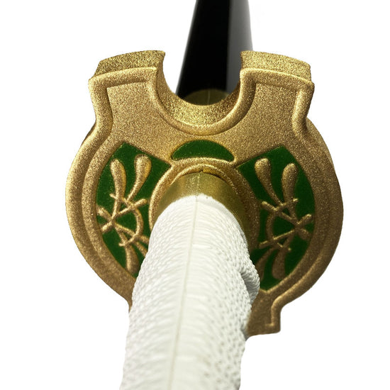 Close-up of the hilt of an Anime Foam Sword Scabbard with intricate gold and green design details