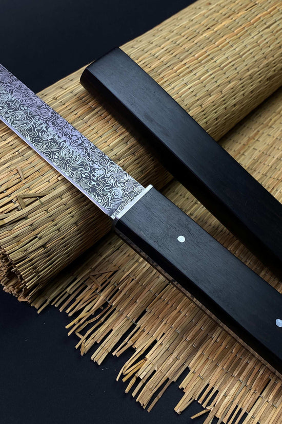 Asuka Suterusu Modern Tanto Knife with intricate blade design and sleek black handle