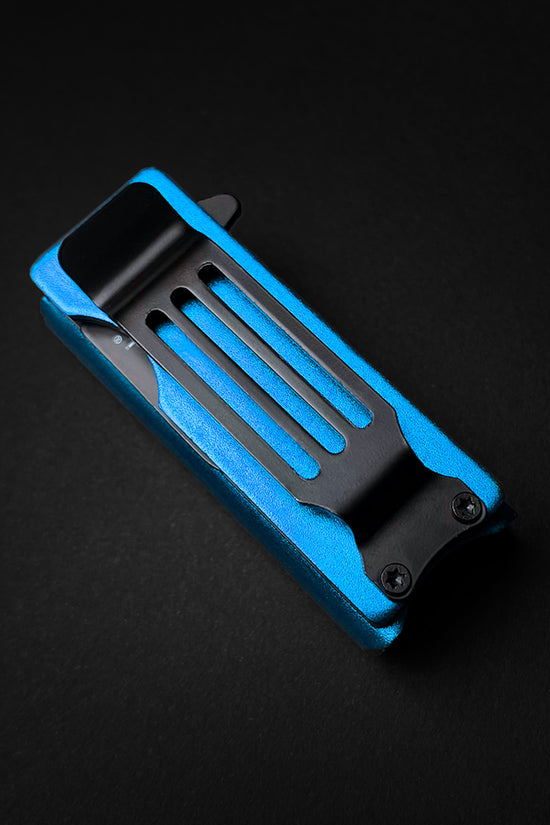 Guild Arms lighter holder case EDC pocket knife with blue handle and black clip on black background