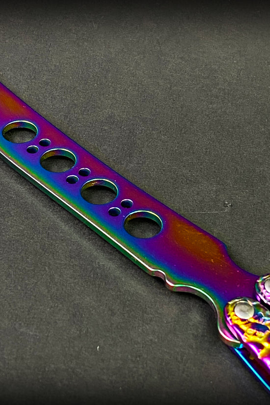 Big Boy Rainbow Butterfly Knife Balisong Trainer with a colorful metallic finish and practice blade