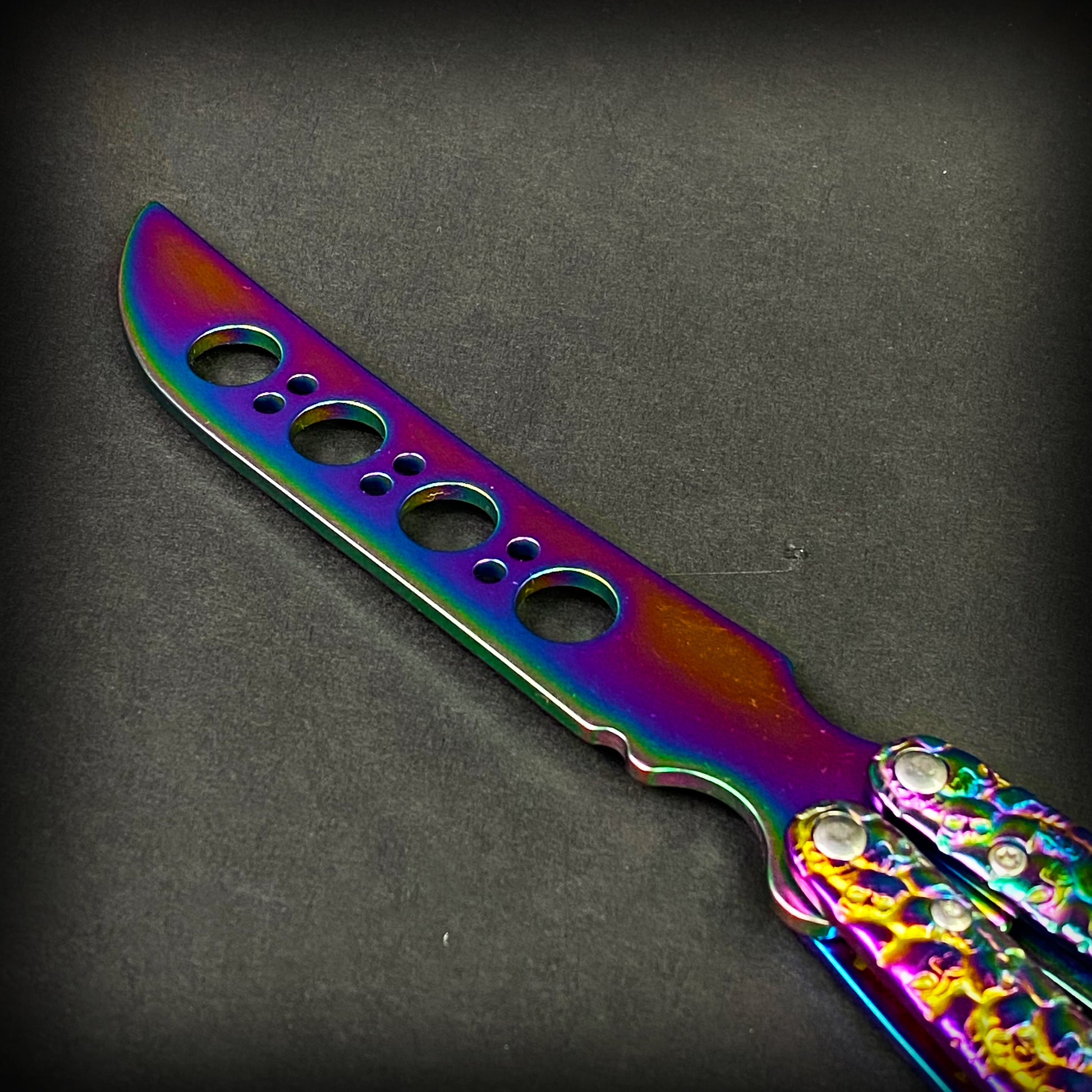 Big Boy Rainbow Butterfly Knife Balisong Trainer with a colorful metallic finish and practice blade
