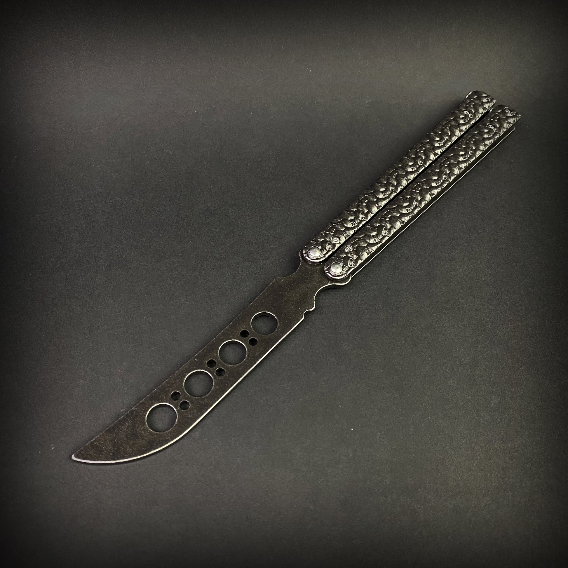 Big Boy's Black Butterfly Trainer by Guild Arms with textured handles for practice and skill development