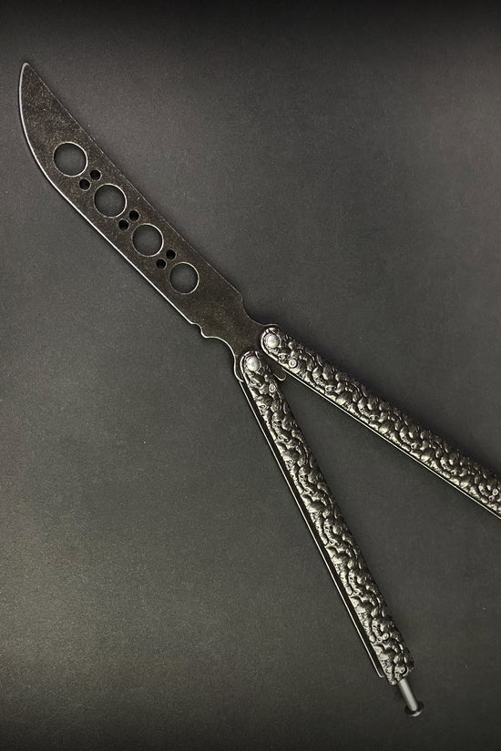 Big Boy's Black Butterfly Trainer with textured handles for safe flipping practice