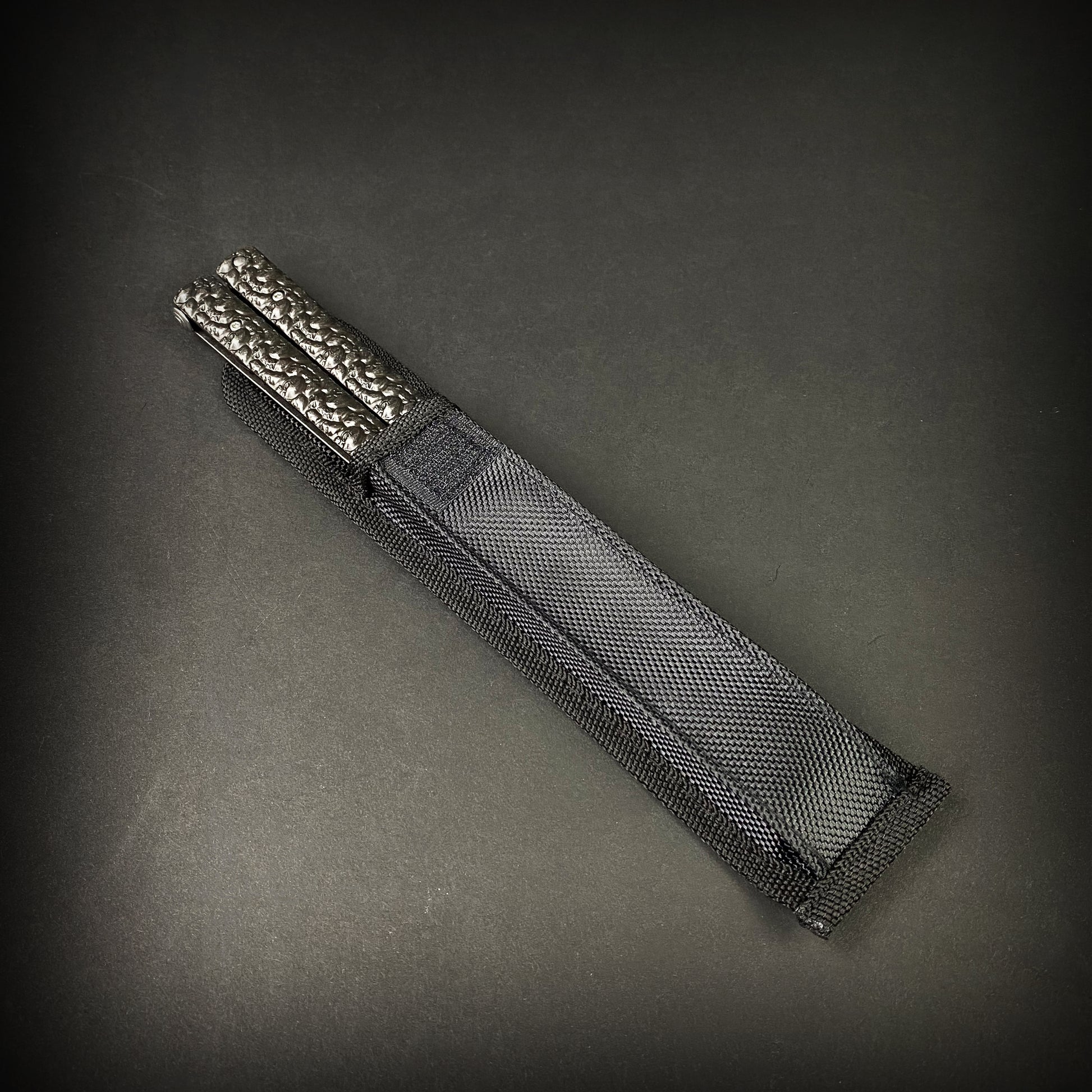 Big Boy's Black Butterfly Trainer with textured handles and protective sheath for safe practice