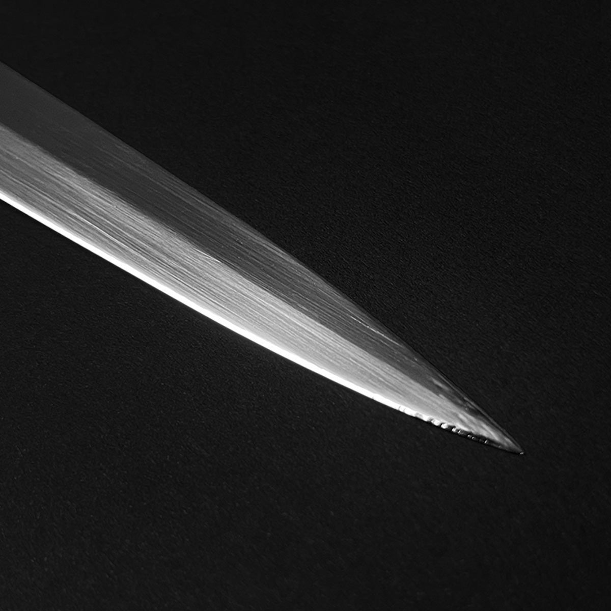 Black medieval dagger w/Black Plastic Scabbard showcasing a sleek, pointed blade design