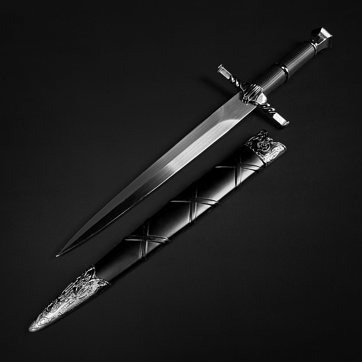 Black medieval dagger w/Black Plastic Scabbard by Guild Arms featuring an ornate hilt and sleek blade
