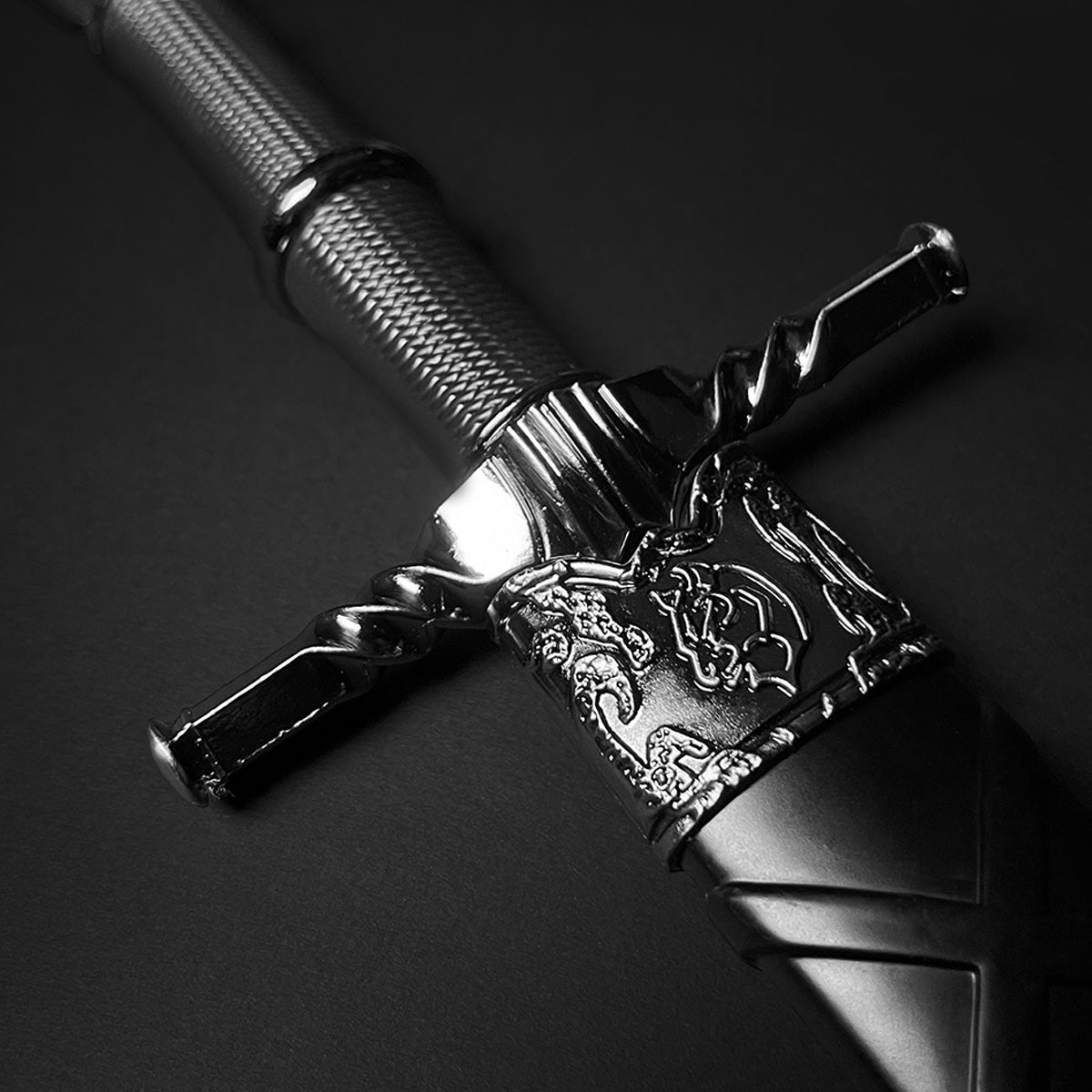 Black medieval dagger w/Black Plastic Scabbard featuring an ornate handle and metallic finish
