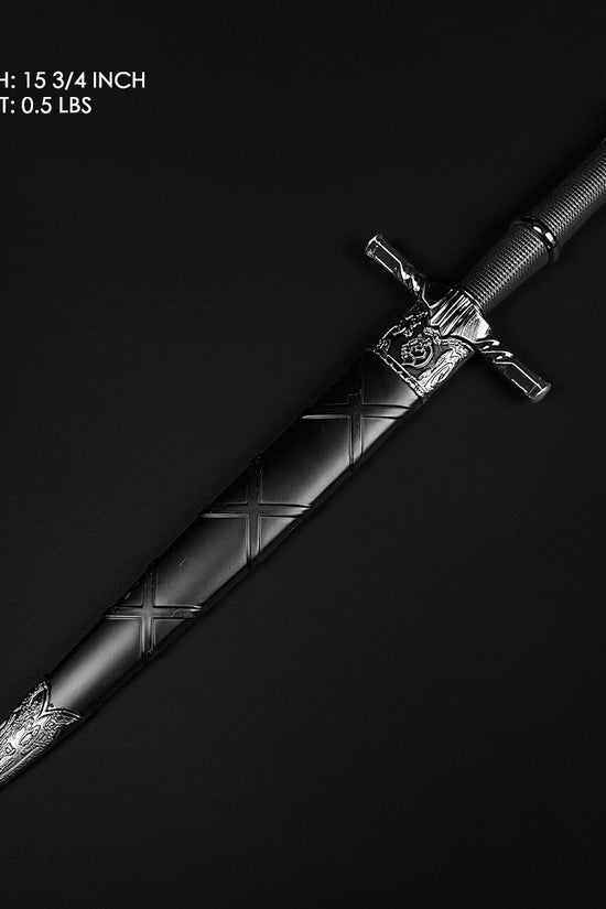 Black medieval dagger w/Black Plastic Scabbard featuring a decorative handle and a sleek blade design