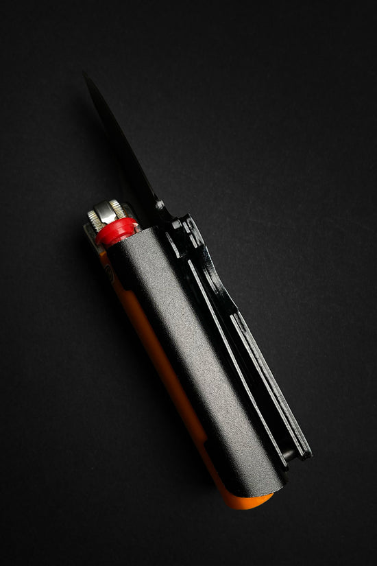 Guild Arms Lighter Case marijuana pocket knife with black metal handle and integrated orange lighter