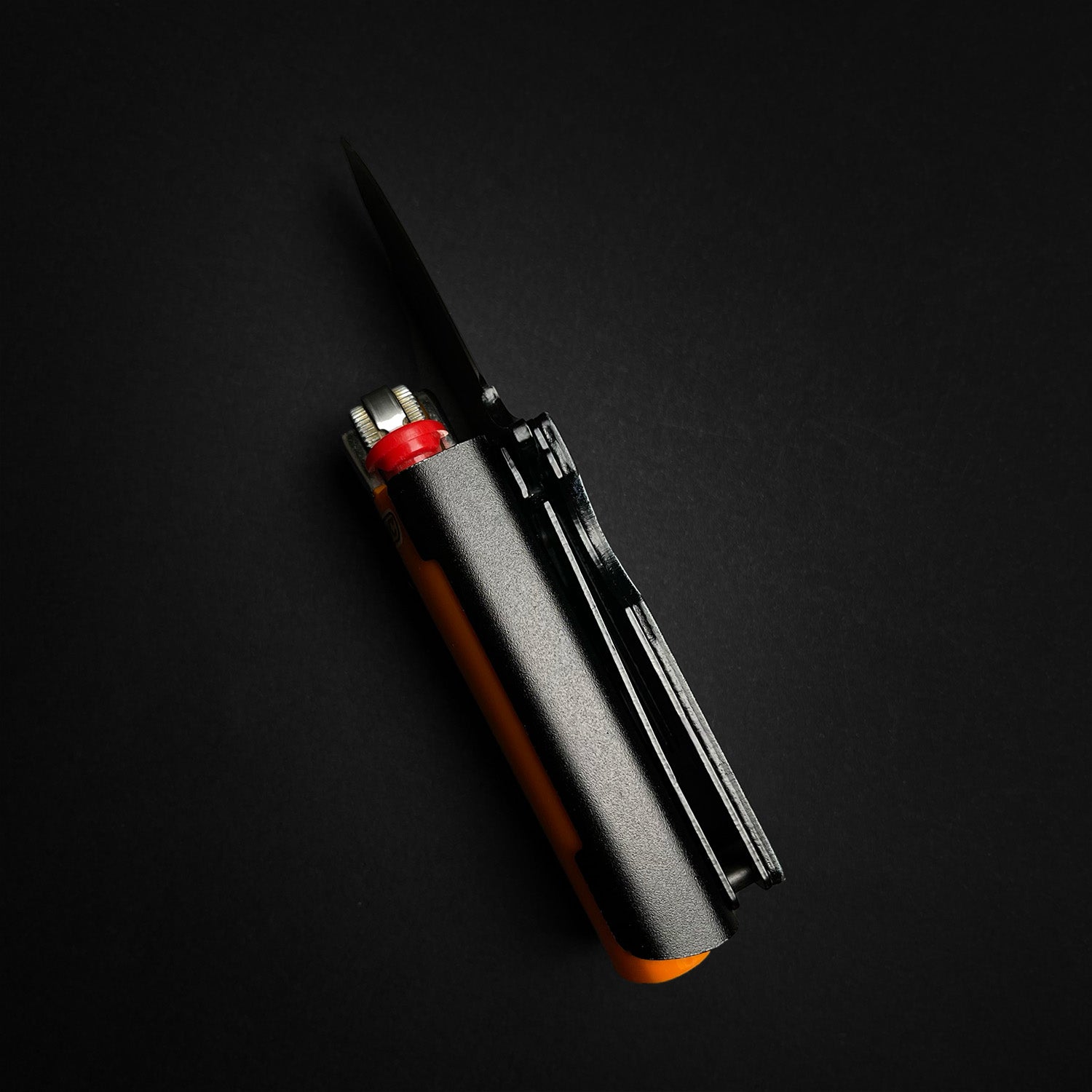 Guild Arms Lighter Case marijuana pocket knife with black metal handle and integrated orange lighter
