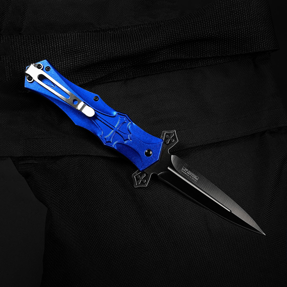 Guild Arms blue cross handle pocket knife with spring assisted blade for easy one-handed opening