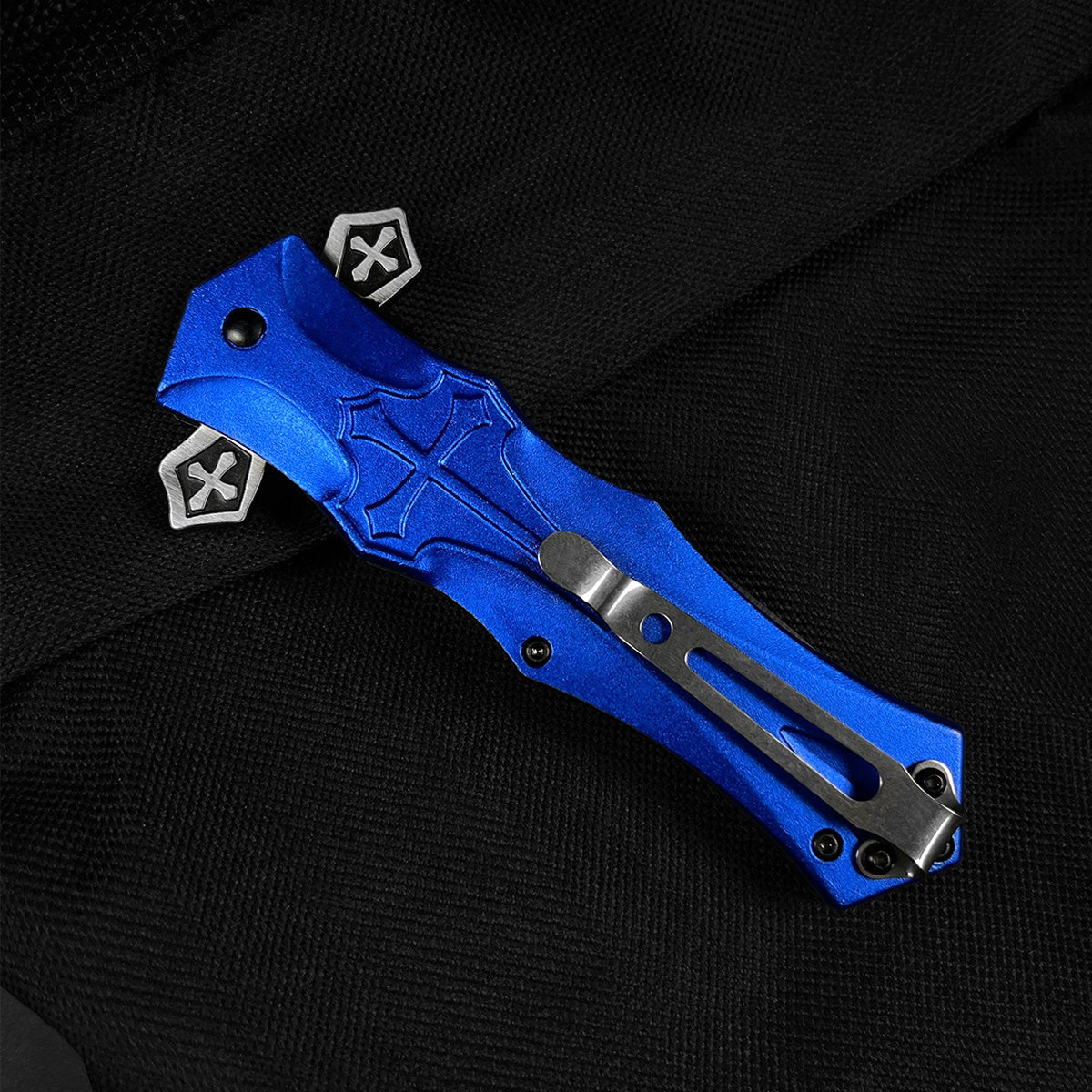 Guild Arms blue cross handle pocket knife with sleek design and spring-assisted opening