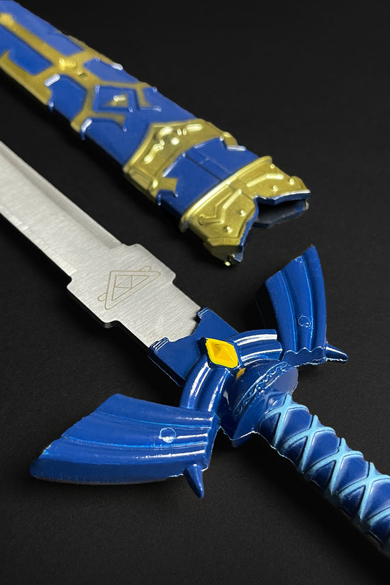 Guild Arms blue fantasy sword letter opener with intricate design and bold colors