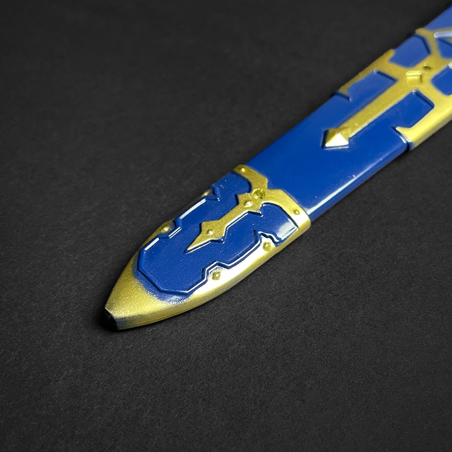 Guild Arms blue fantasy sword letter opener with intricate gold detailing and a sleek design