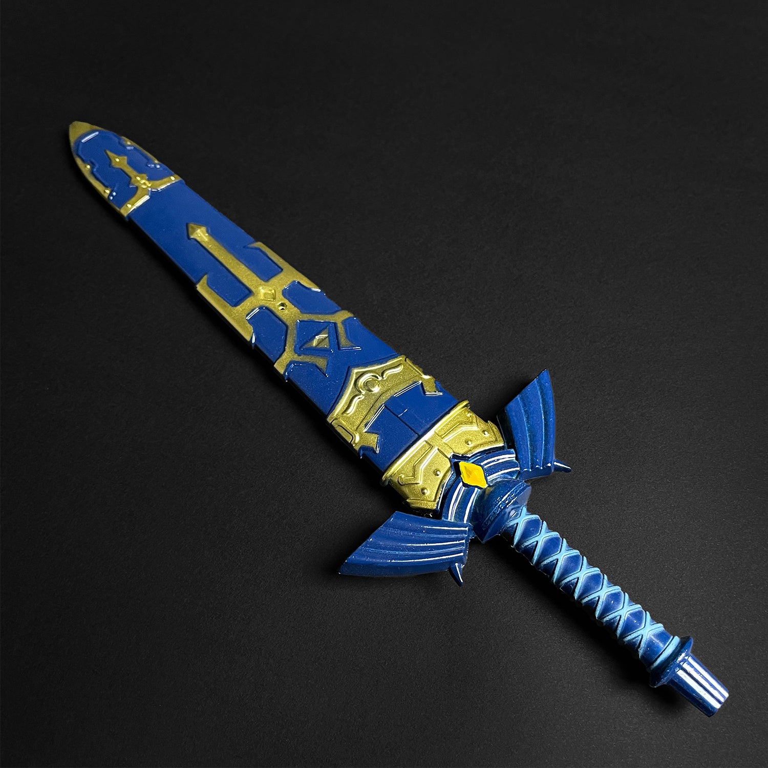 Guild Arms blue fantasy sword letter opener with intricate designs in blue and gold finish