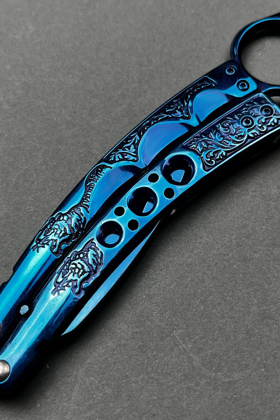 Guild Arms blue practice butterfly knife for beginners with detailed engraved design