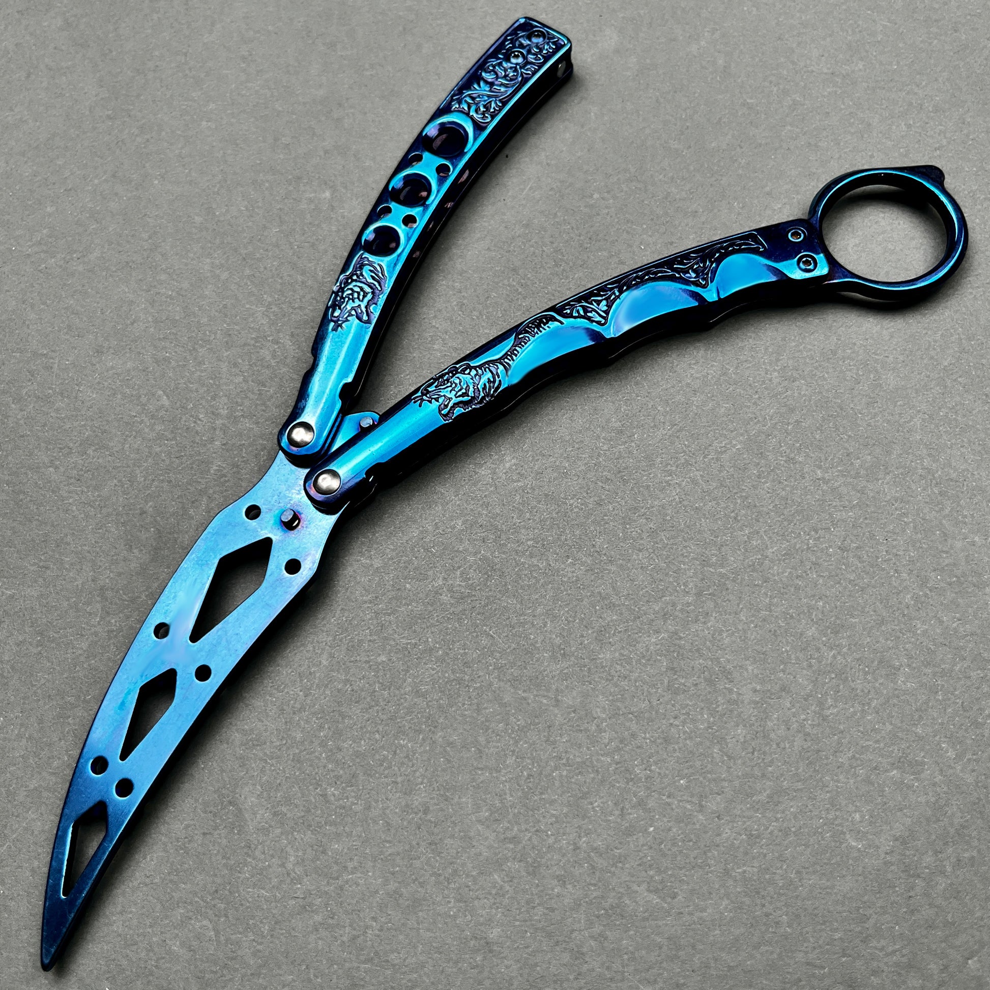 Guild Arms blue metal butterfly knife trainer detailed with engravings practice butterfly knife for beginners