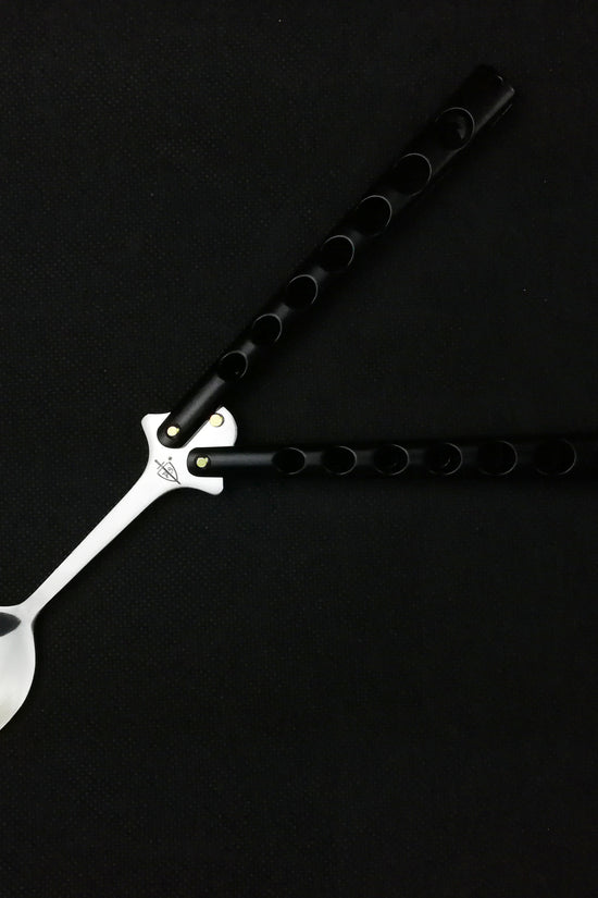Butterfly Trainer Balisong Spoon Black with a sleek dual-tone design for safe practice and skill development