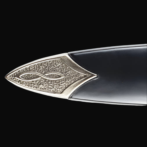 Guild Arms Blue Scottish Dirk Dagger close up of ornate engraved silver chape and glossy blue scabbard tip