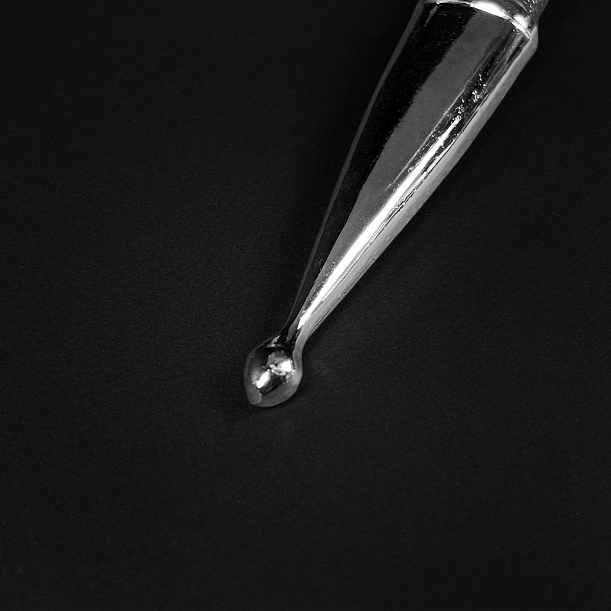 Detailed view of the classic medieval dagger with a polished blade tip and sleek design