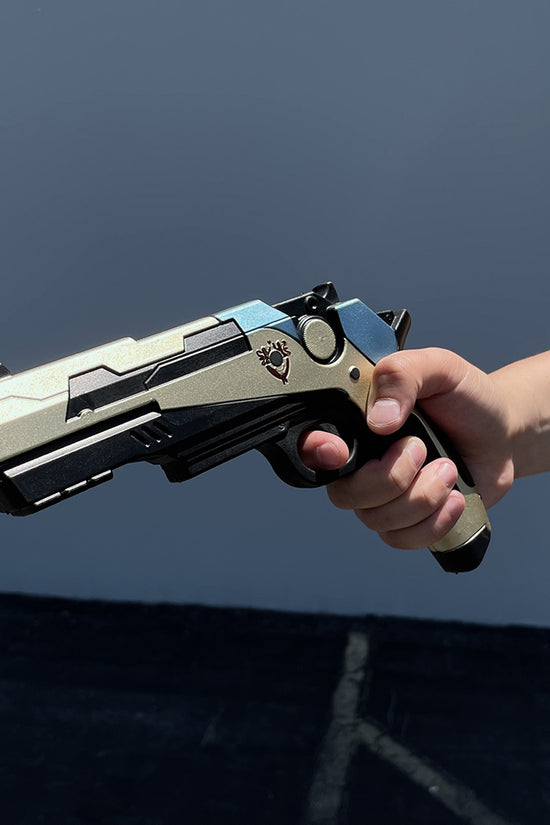 Otaku Gear cosplay foam pistol gun held in hand with detailed futuristic design