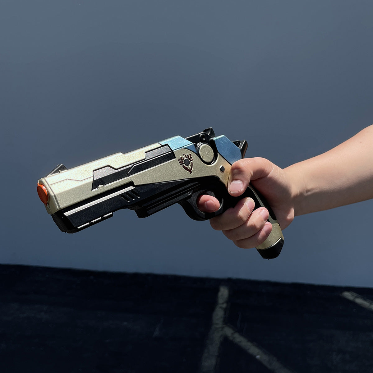 Otaku Gear cosplay foam pistol gun held in hand with detailed futuristic design