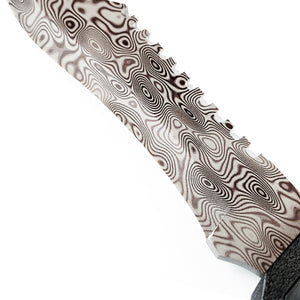 Guild Arms survival knife close up showing damascus pattern fixed blade hunting knife with serrated spine