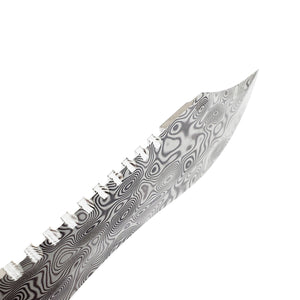Guild Arms survival knife close up of blade with damascus pattern fixed blade hunting knife and sawtooth spine