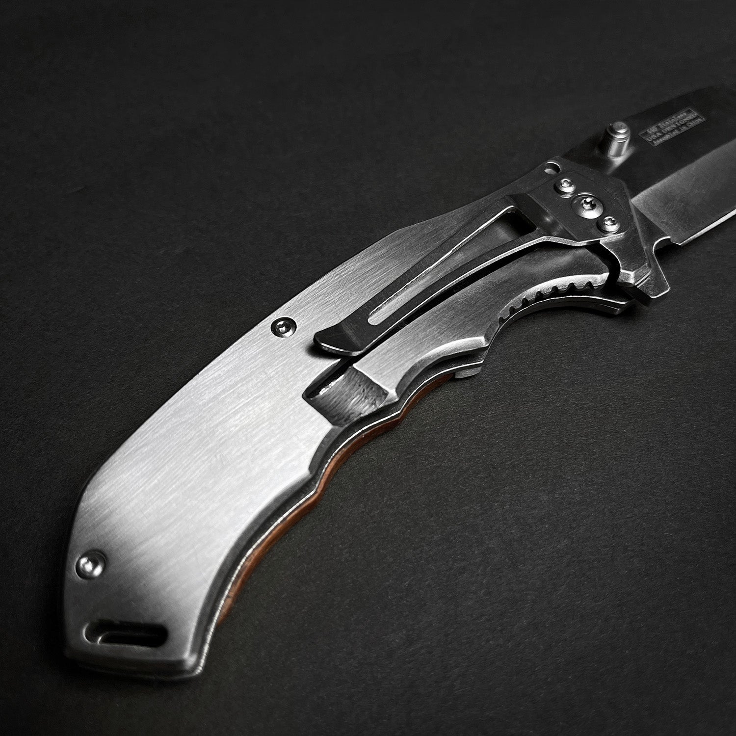 Falcon EDC Falcon Wooden Handle Pocket Knives featuring a sleek stainless steel blade and spring-assisted mechanism