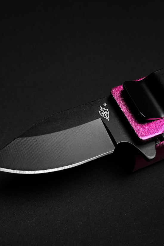 Guild Arms Lighter Knife Case Spring Assisted Pocket Knife Pink closeup of black blade and metallic pink handle with pocket clip