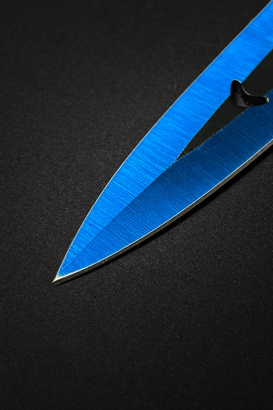 Close-up of Falcon 6 PC Blue Throwing Knives Set with sleek blue finish and sharp blades