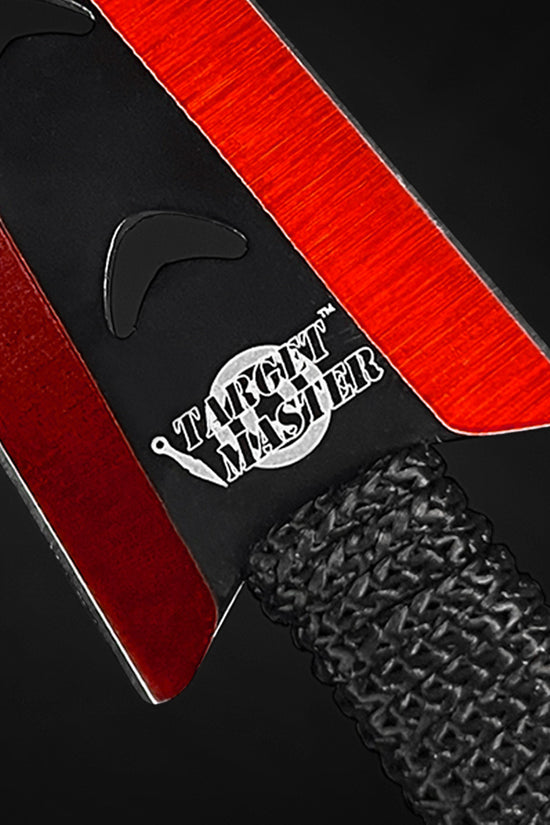 Close-up of Target Master Falcon 6 PCS Red Throwing Knives Set with sleek red blades and textured grips