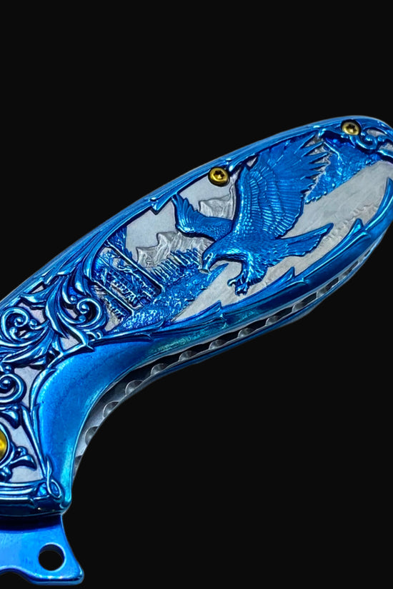 Falcon Blue Spring Assisted Knife Eagle Handle with detailed eagle design and engraved blue metal grip