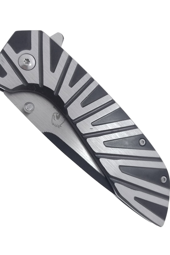 Falcon EDC Spring Assisted Pocket Knife with a sleek metallic design and ergonomic grip