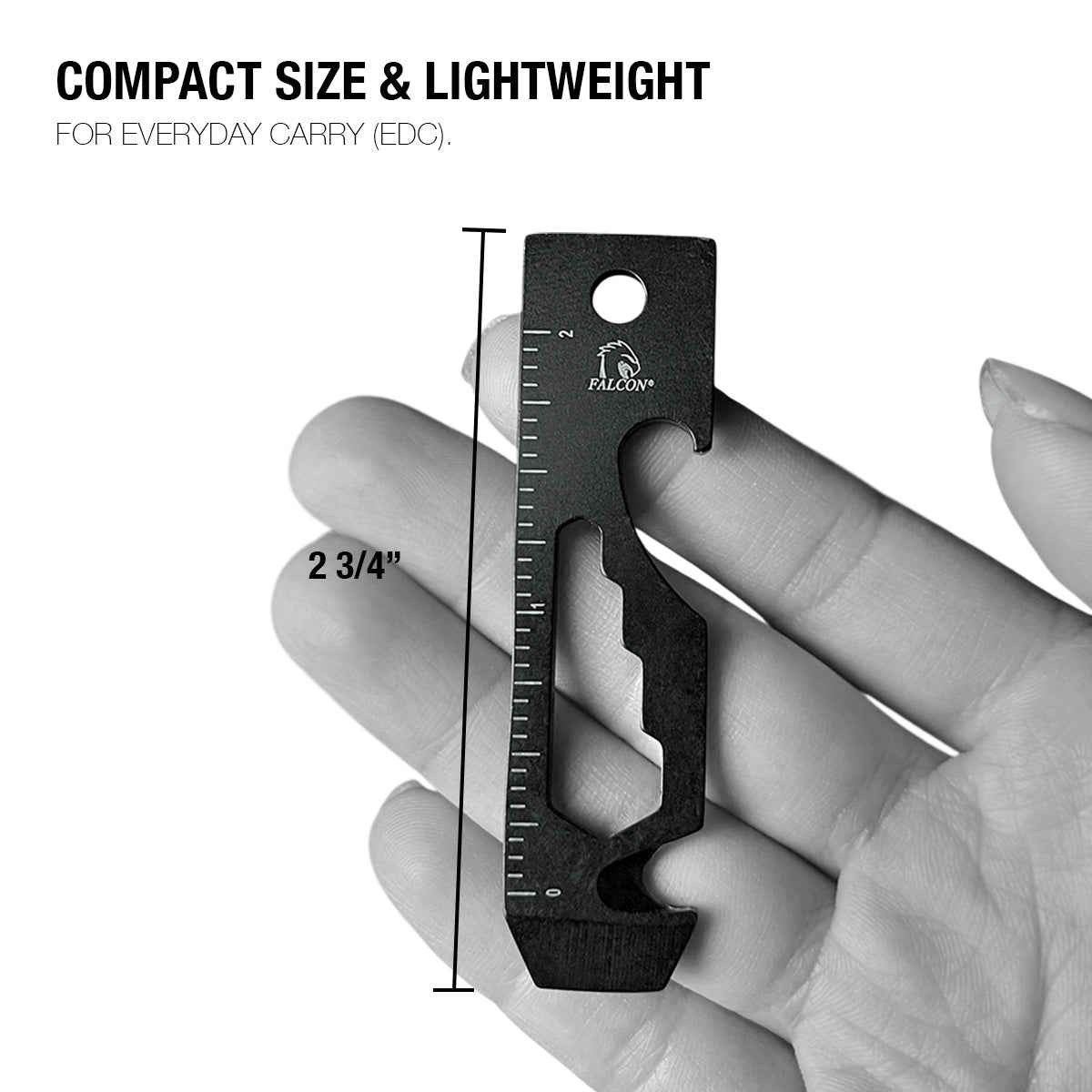 Falcon multi-tool keychain compact black EDC multitool with ruler markings bottle opener wrench held in hand