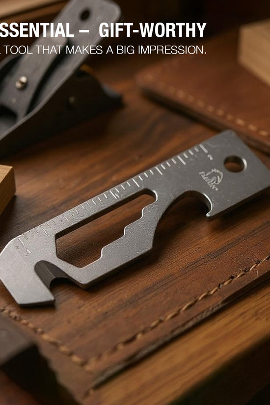 Falcon multi-tool keychain stainless steel EDC tool with bottle opener wrench hex cutouts ruler markings on leather tray