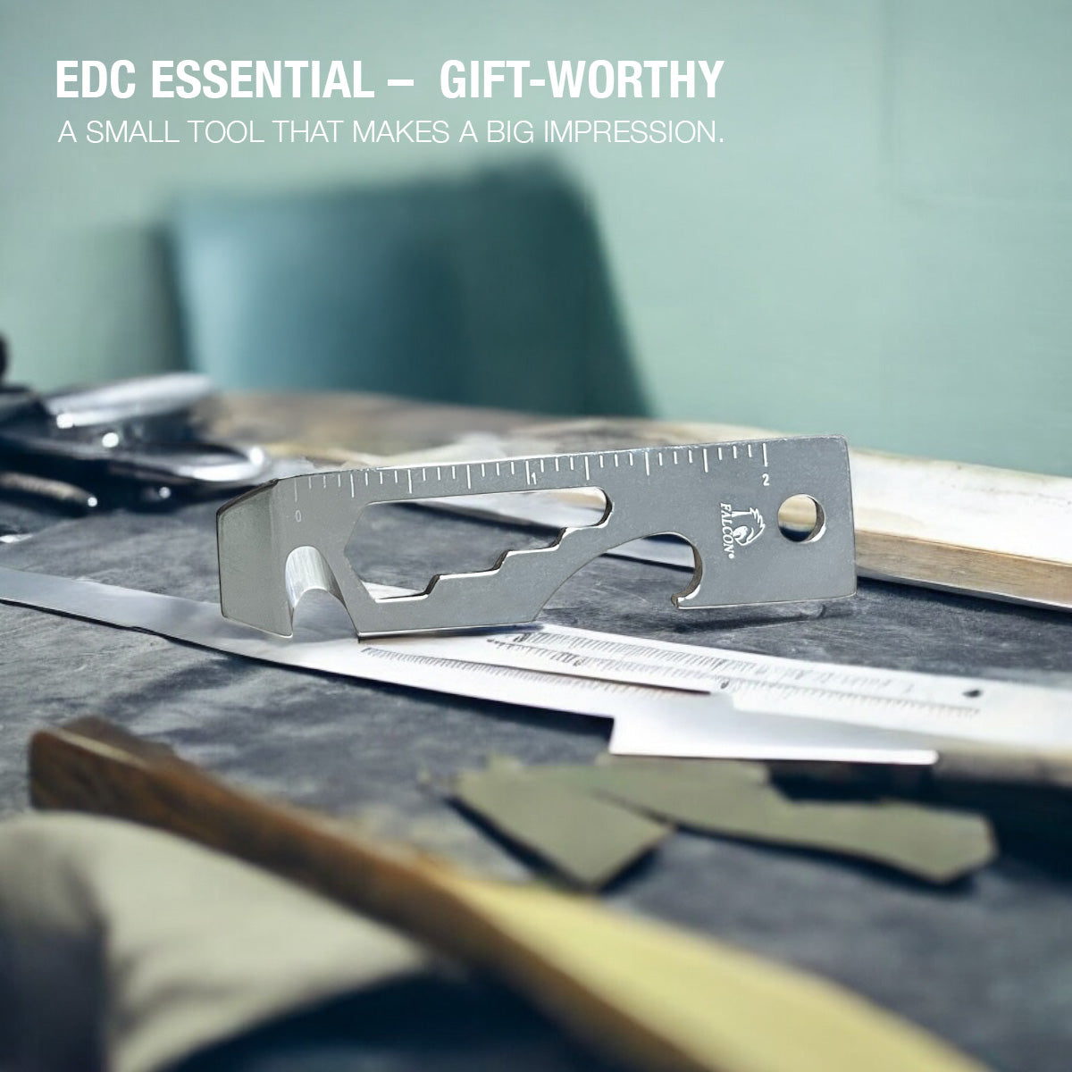 Falcon keychain multitool for outdoor use with ruler and bottle opener on a workbench