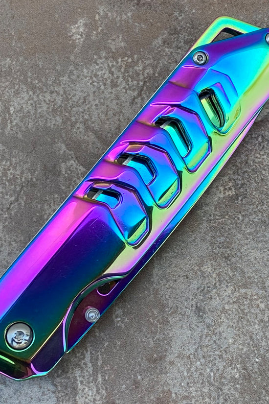 Falcon Mirror Rainbow Spring Assisted Pocket Knife with a sleek and colorful design for easy handling