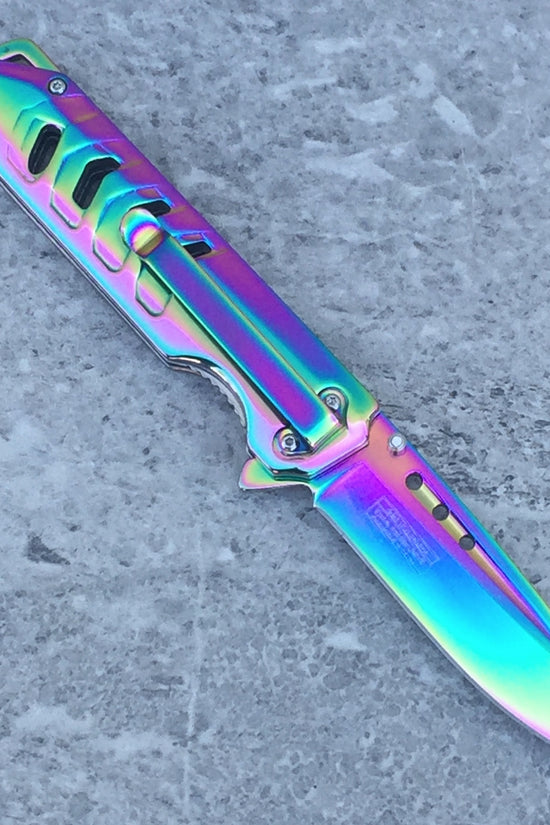 Falcon Mirror Rainbow Spring Assisted Pocket Knife with a colorful, reflective blade and ergonomic handle