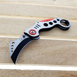 Falcon Red Karambit Spring Assisted Knife with a sleek design and black blade for easy use