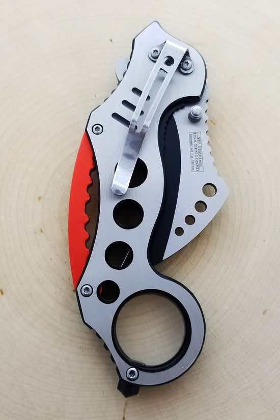 Falcon Red Karambit Spring Assisted Knife with ergonomic handle and stainless steel blade
