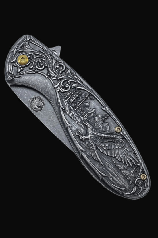 Guild Arms spring assisted falcon knife pocket knife with detailed eagle engraving on handle