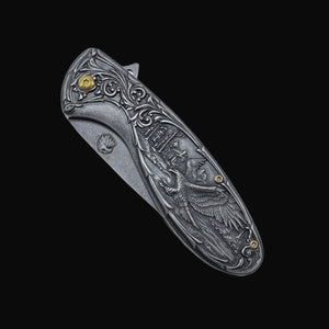 Guild Arms spring assisted falcon knife pocket knife with detailed eagle engraving on handle