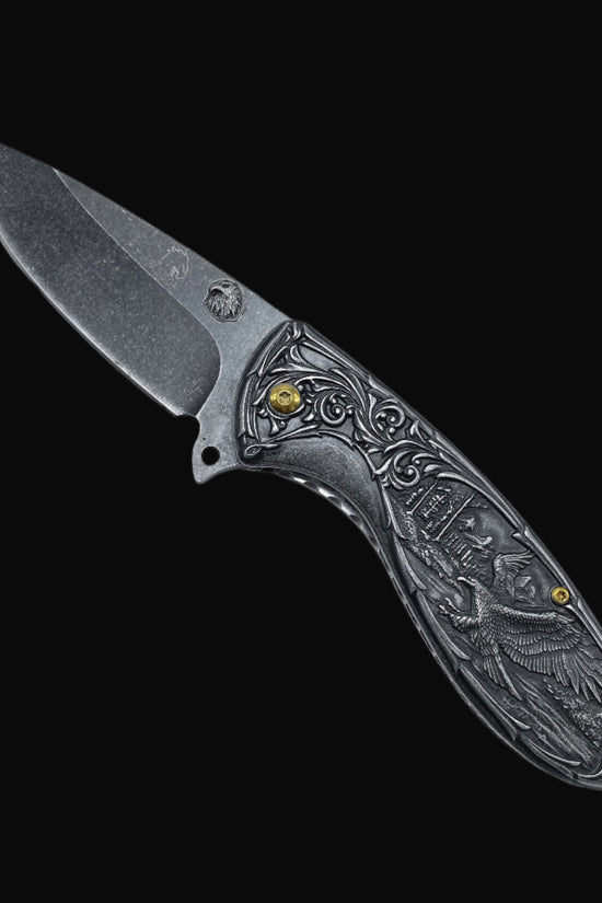 Guild Arms spring assisted falcon knife with engraved handle and stonewashed blade