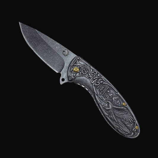 Guild Arms spring assisted falcon knife with engraved handle and stonewashed blade