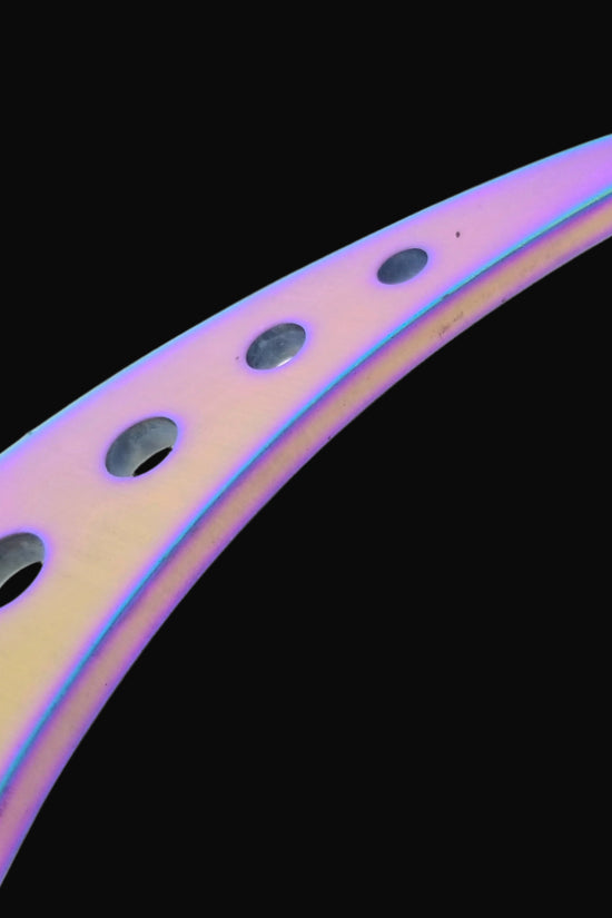 Falcon training karambit for beginners with curved design and holes for grip practice