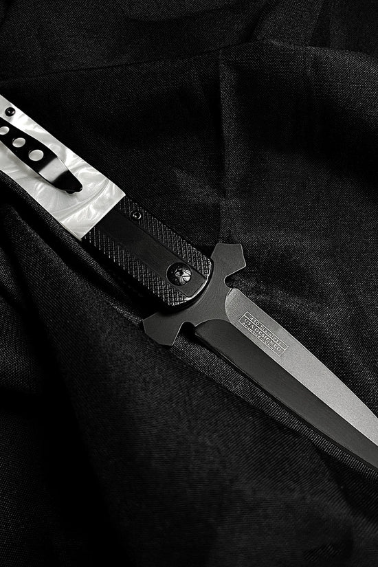 Falcon White Handle w Cross Spring Assisted Pocket Knife by Guild Arms with sleek black blade design