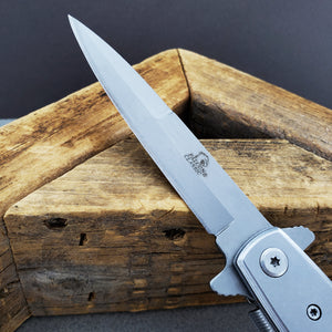 Falcon White Spring Assisted Pocket Knife with a sleek blade and ergonomic handle for easy use