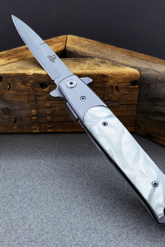 Falcon White Spring Assisted Pocket Knife with sleek design and stainless steel blade