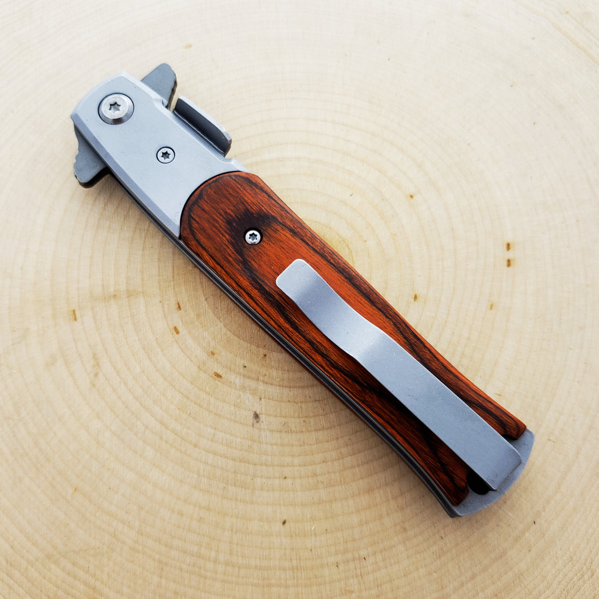 Falcon Wood Spring Assisted Pocket Knife with a sleek design and sturdy grip for everyday use